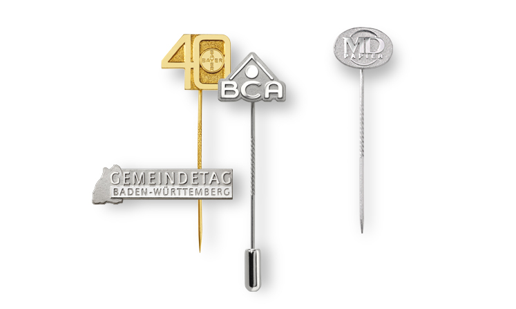 Lapel pins made of embossed precious metal