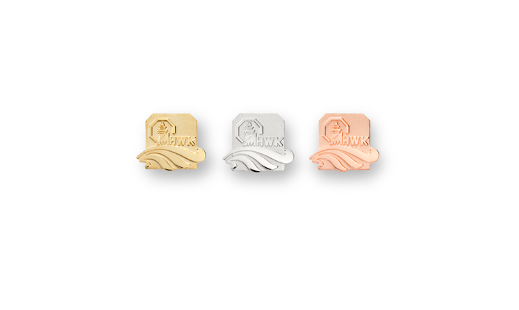 Lapel pins and award pins made of precious metal with laurels