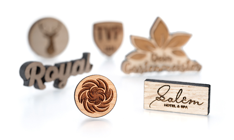 lapel pins, pin badges and brooches made of wood