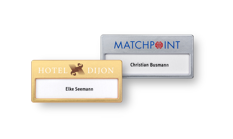 Plastic name badges with metallic finishes