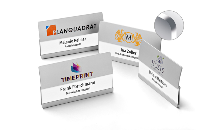 Curved metal name badges with space for two lines