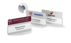 Metal name badges with rounded corners