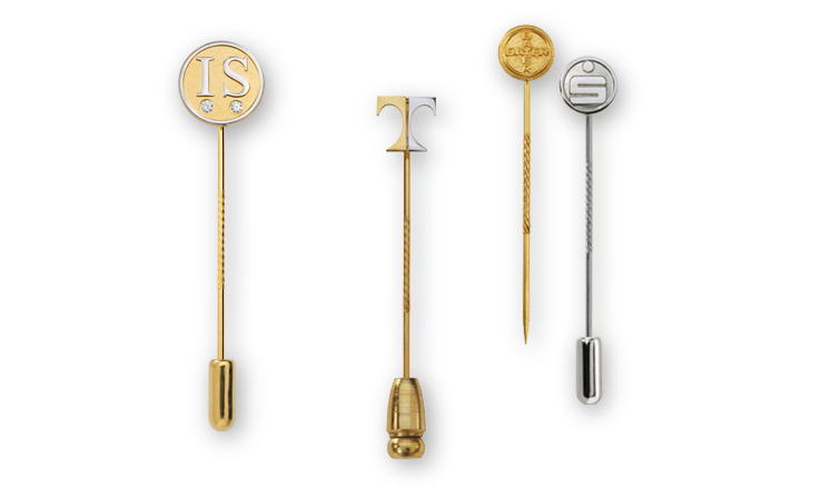 Embossed lapel pins and pin badges made of precious metal