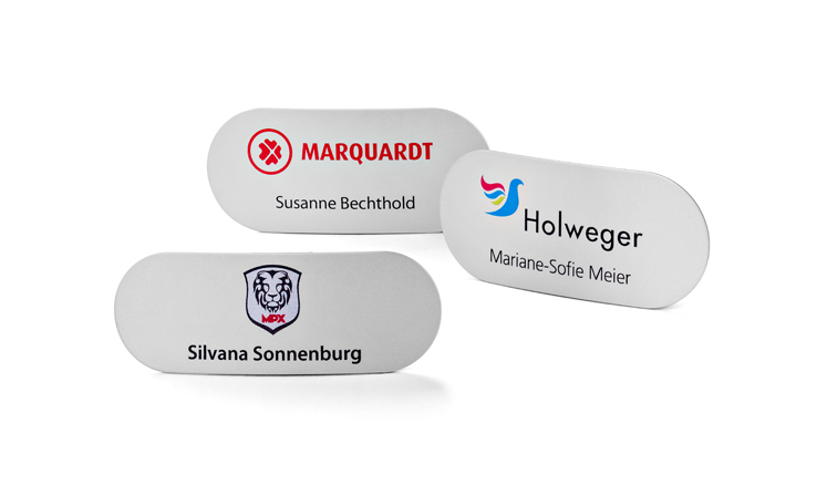 Name badges made of metal with rounded corners